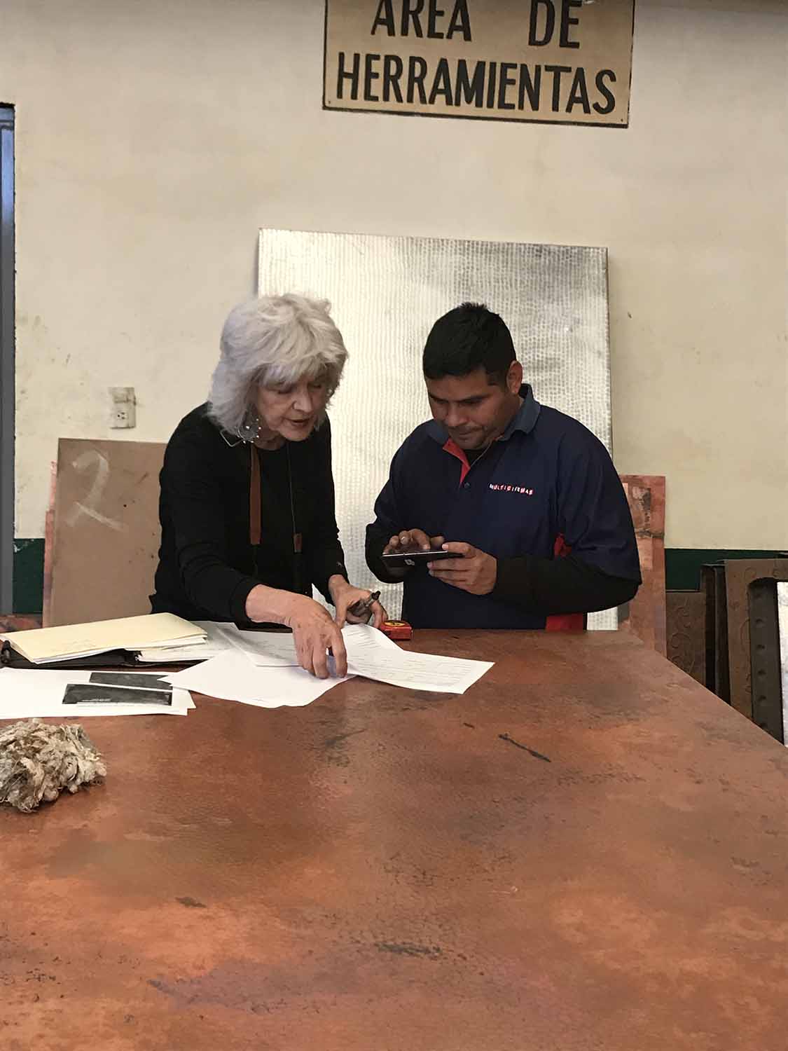 Reviewing specifications with the workshop.